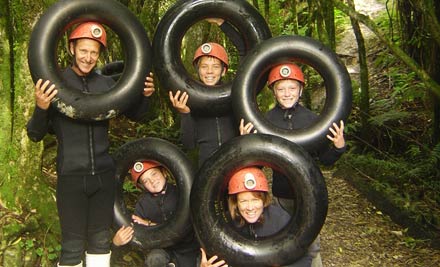 $89 for a "Tube It" Black Water Rafting Adventure - Options for up to Four People (value up to $616)