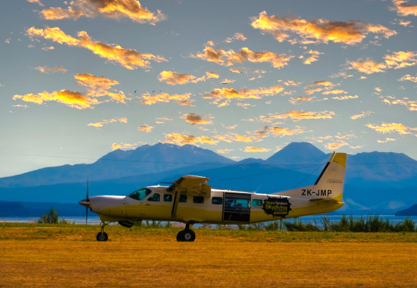 12000-Feet Tandem Skydive Package incl. $40 Voucher Towards a Camera Package or Exit Image - Option for 15000-Feet