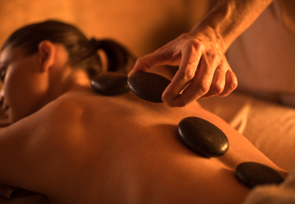 Embrace the Season with This Bounce Back Pamper Package for One Person incl. Hot Stone Back Massage, Diamond Dermabrasion or Hydrating Facial, & a Head & Neck Massage - Option for Three Sessions