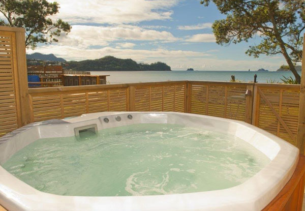 Coromandel Beachfront Break for Two People incl. Late Checkout, Free Wifi, & Use of Kayaks, Beach Bar, BBQ & Spa Pool - Options for Two- or Three-Night Stay