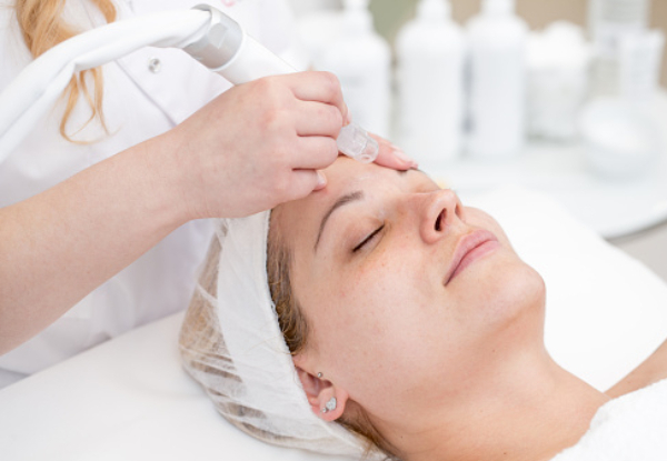 Microdermabrasion Facial & Eyebrow or Lash Tint for One Person