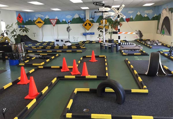 Round of Mini Golf on an Indoor Mini Golf Course