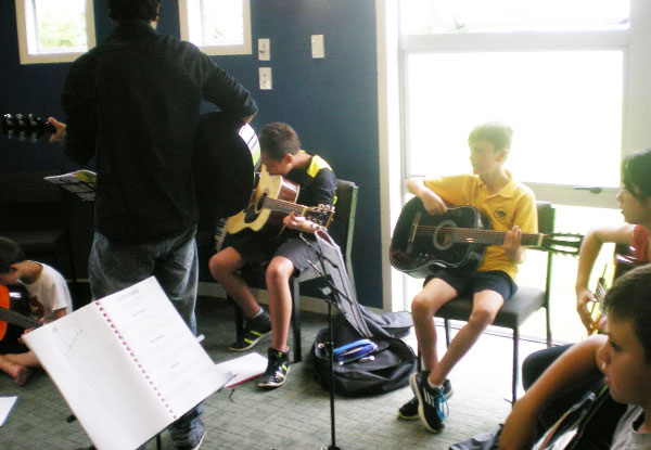 10-Week Beginner Guitar Group Lessons incl. Guitar, Music Sheet Bag, Guitar Bag & Registration Fee - Three Auckland Locations - Available for Different Age Groups - Valid from 3rd February 2025