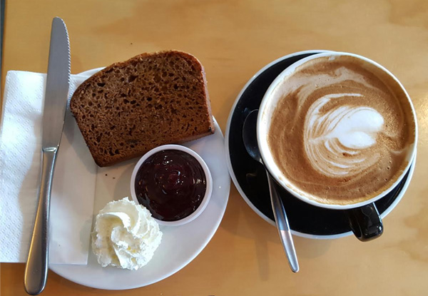 Two Medium Hot Beverages with Two Thick Slices of Fresh Baked Banana Bread